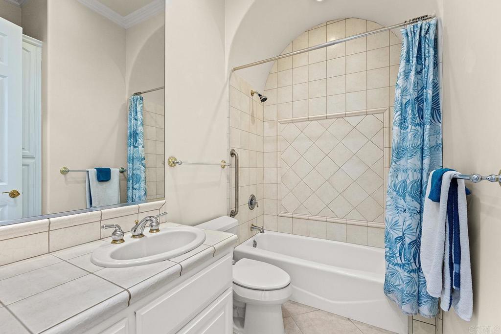 2557 Live Oak Park Road Fallbrook, CA 92028 - Photo 23 of 53 a bathroom with a sink a toilet and a bathtub
