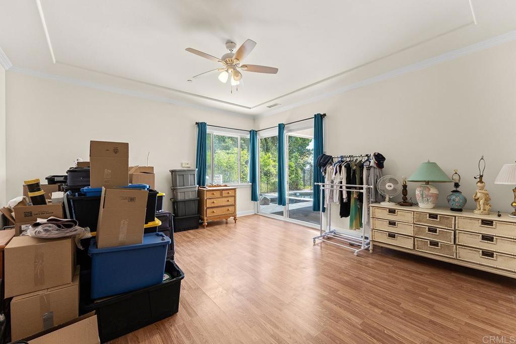 2557 Live Oak Park Road Fallbrook, CA 92028 - Photo 26 of 53 a bedroom with furniture and a large window