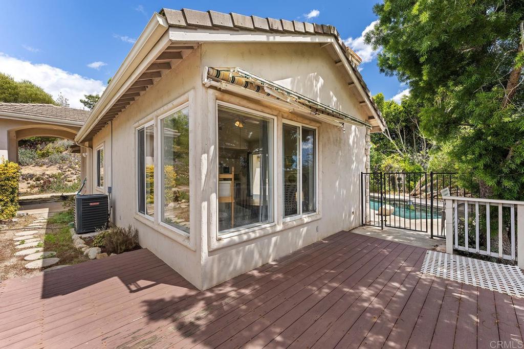 2557 Live Oak Park Road Fallbrook, CA 92028 - Photo 37 of 53 a view of a house with a small yard and wooden floor and fence