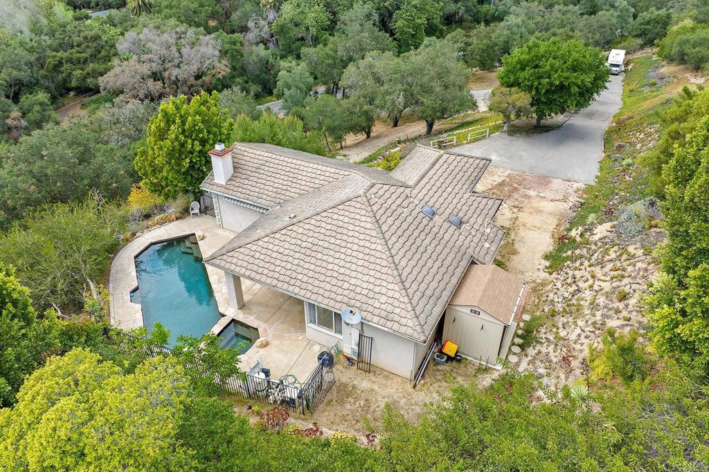 2557 Live Oak Park Road Fallbrook, CA 92028 - Photo 50 of 53 an aerial view of a house with swimming pool and garden