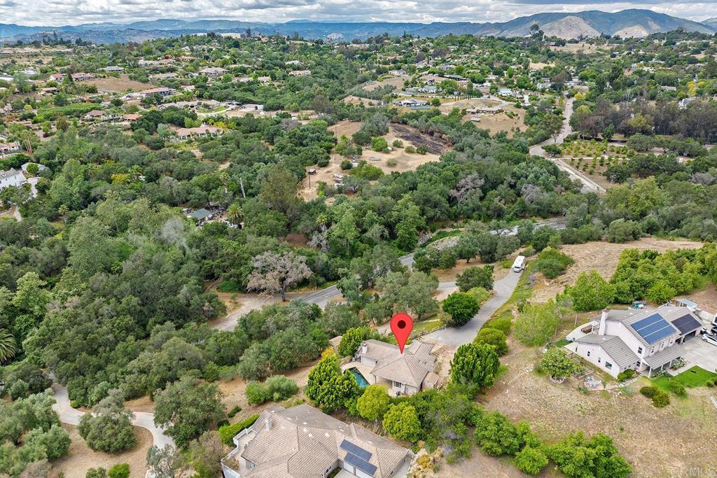 2557 Live Oak Park Road Fallbrook, CA 92028 - Photo 52 of 53 an aerial view of residential houses with outdoor space and trees