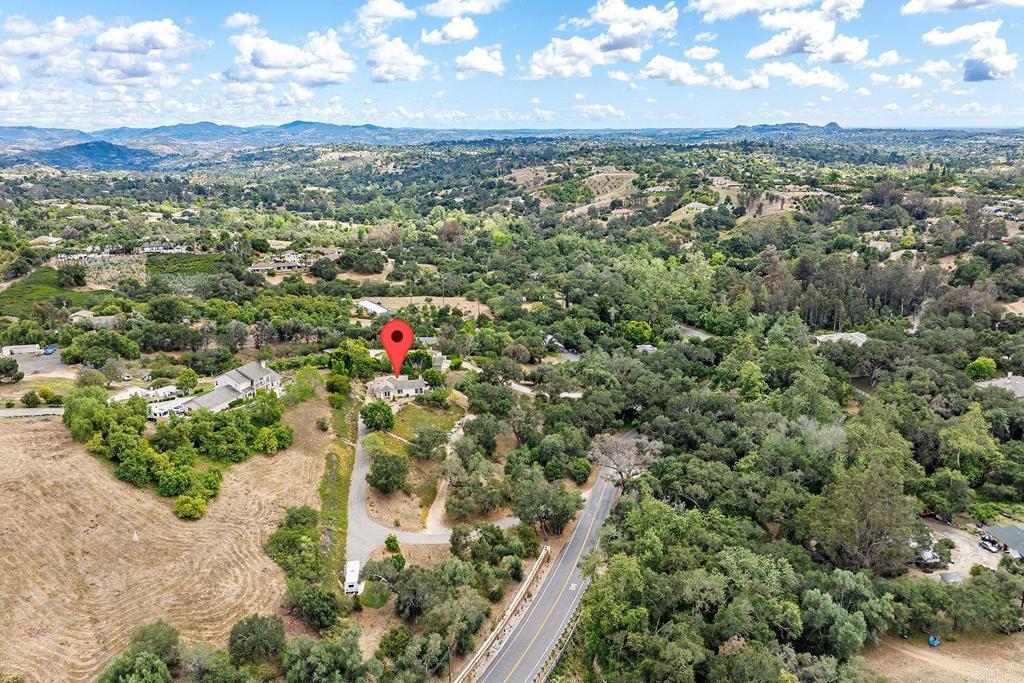 2557 Live Oak Park Road Fallbrook, CA 92028 - Photo 53 of 53 an aerial view of residential houses with outdoor space and trees