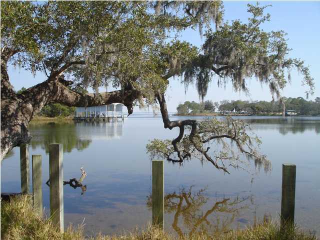 31 Beacon Point Drive Santa Rosa Beach, FL 32459 - Photo 15 of 18 a view of a lake with outdoor space