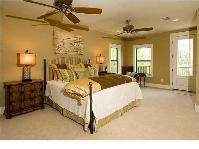 31 Beacon Point Drive Santa Rosa Beach, FL 32459 - Photo 7 of 18 a bed room with a bed and a lamp