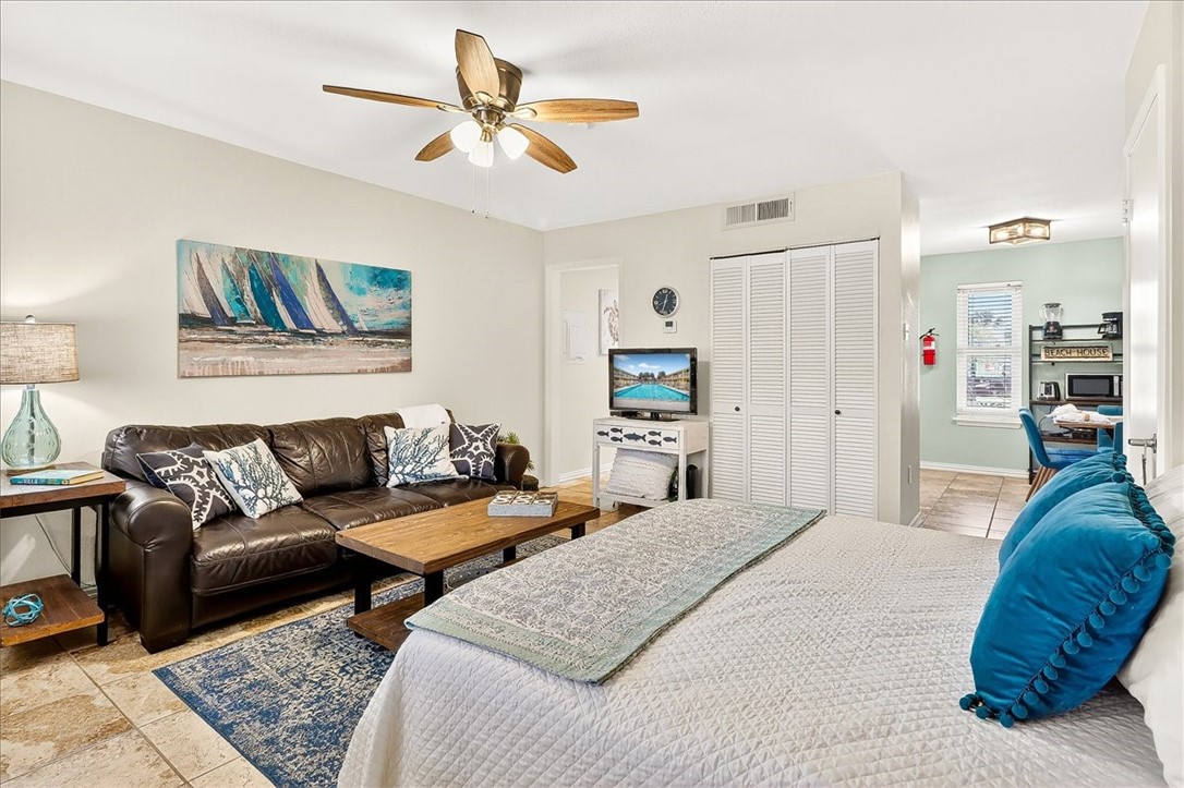 622 Beach Access Road, Unit 216 Port Aransas, TX 78373 - Photo 19 of 32 a living room with furniture and a couch