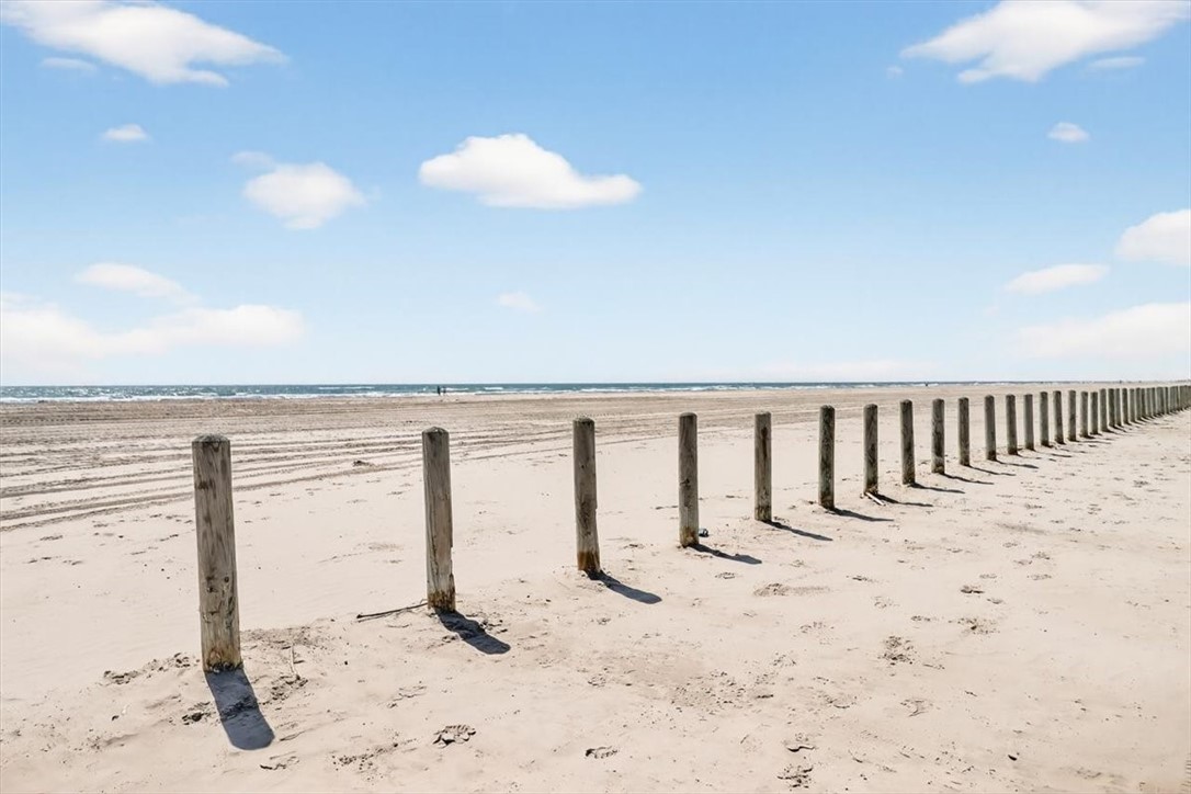 622 Beach Access Road, Unit 216 Port Aransas, TX 78373 - Photo 27 of 32 a view of a room with wooden floor
