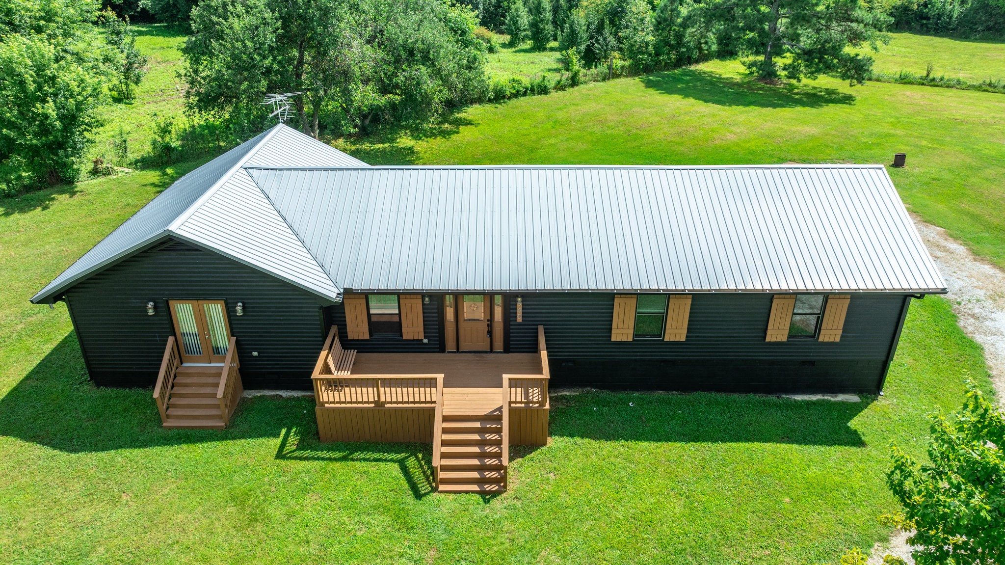 340 Old Spring Creek Road Estill Springs, TN 37330 - Photo 38 of 60 a front view of a house with garden