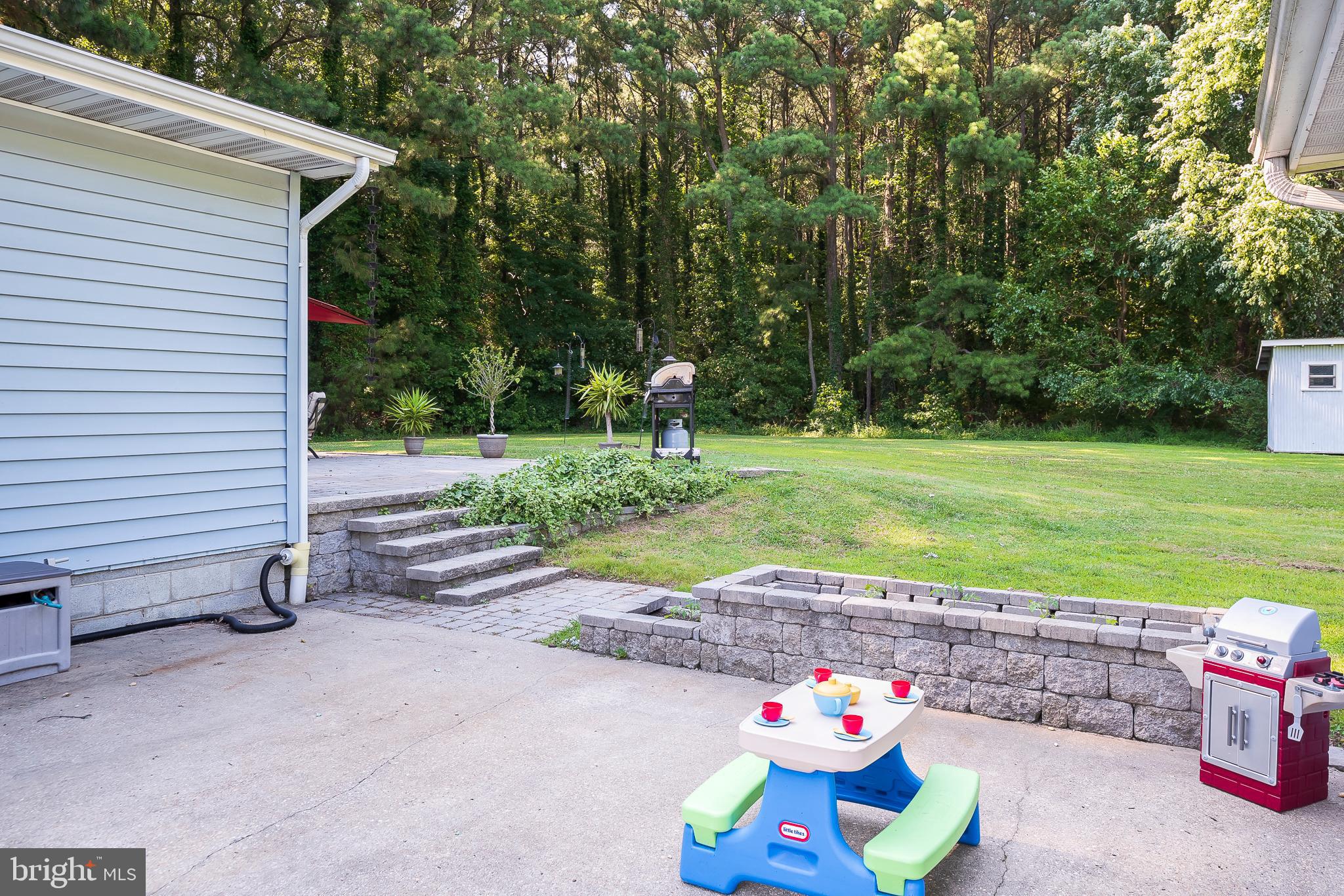 104 Golt Road Chester, MD 21619 - Photo 24 of 29 Patio area in between Garage / House