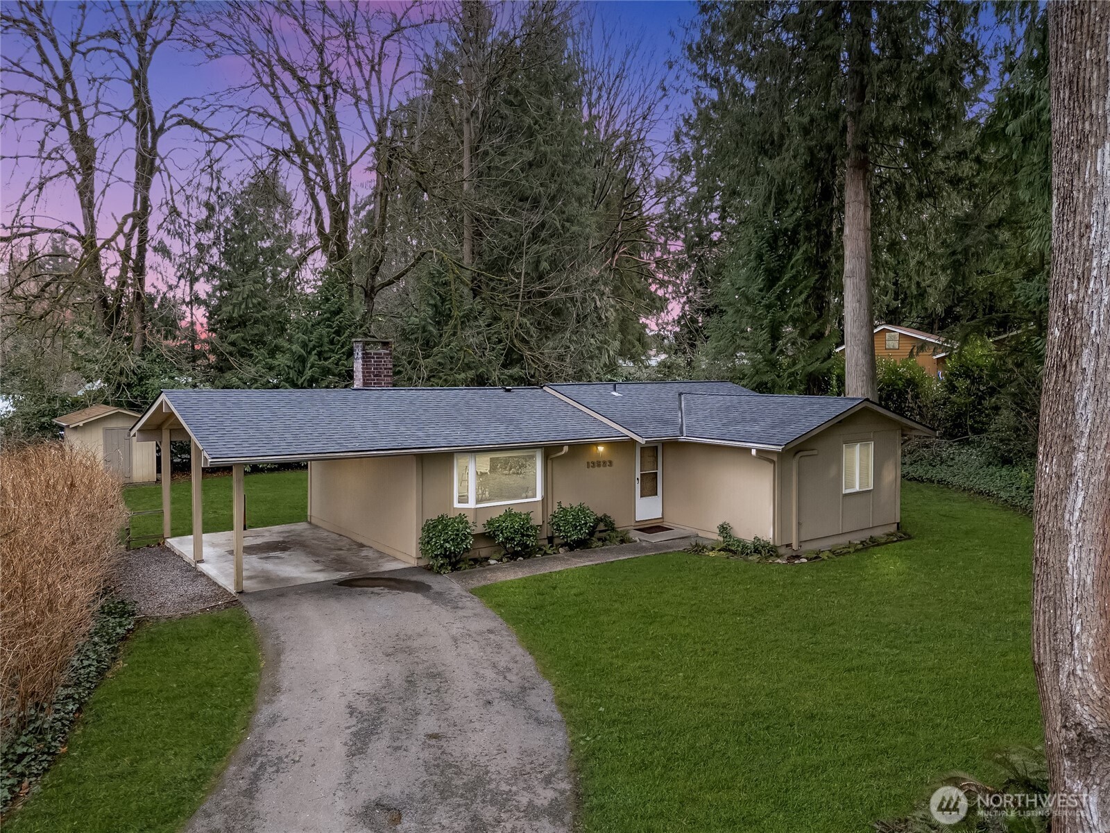 13523 80th Street Southeast Snohomish, WA 98290 - Photo 1 of 12 a front view of a house with a garden