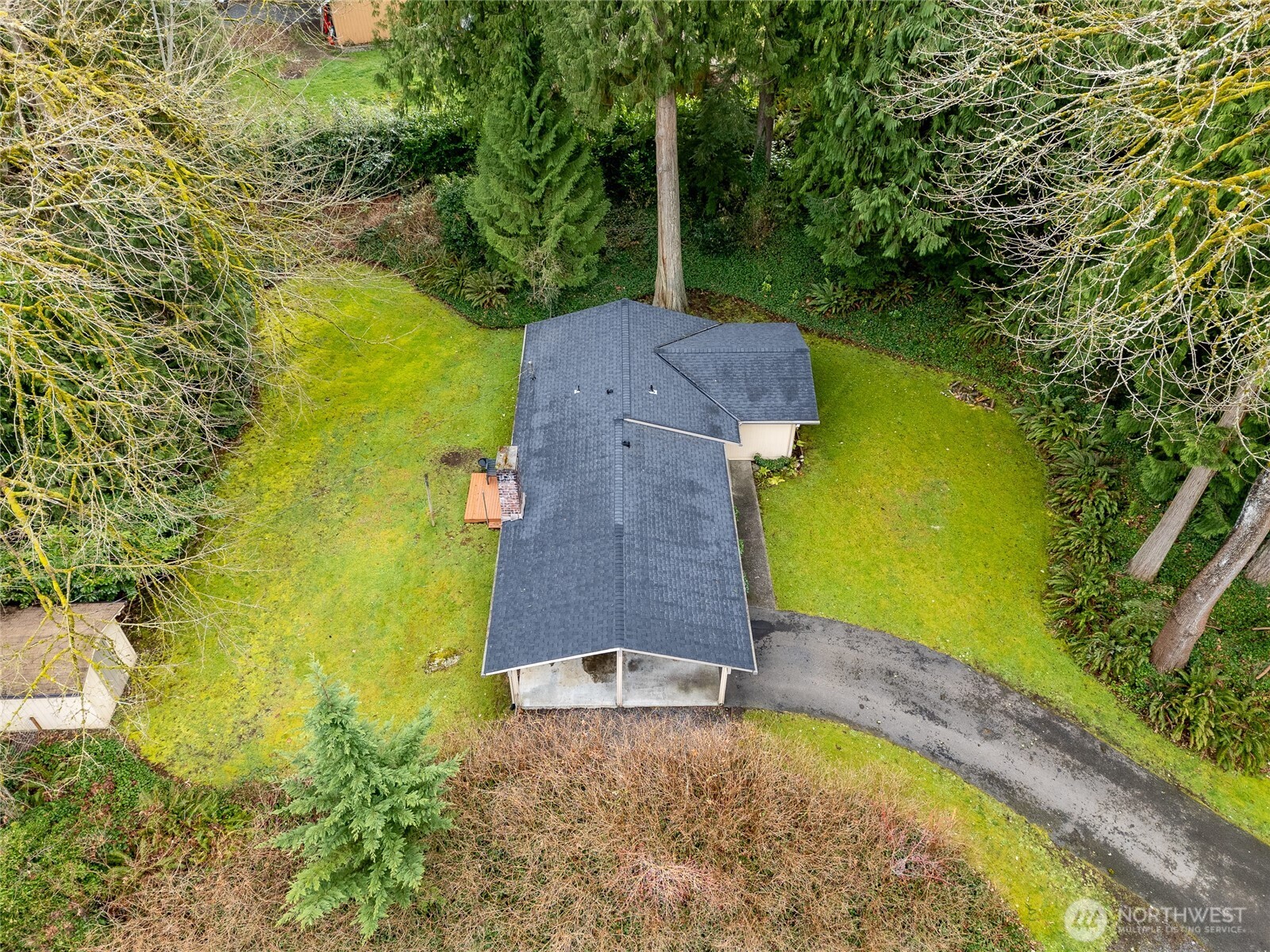 13523 80th Street Southeast Snohomish, WA 98290 - Photo 11 of 12 a aerial view of a house with a yard and lake view