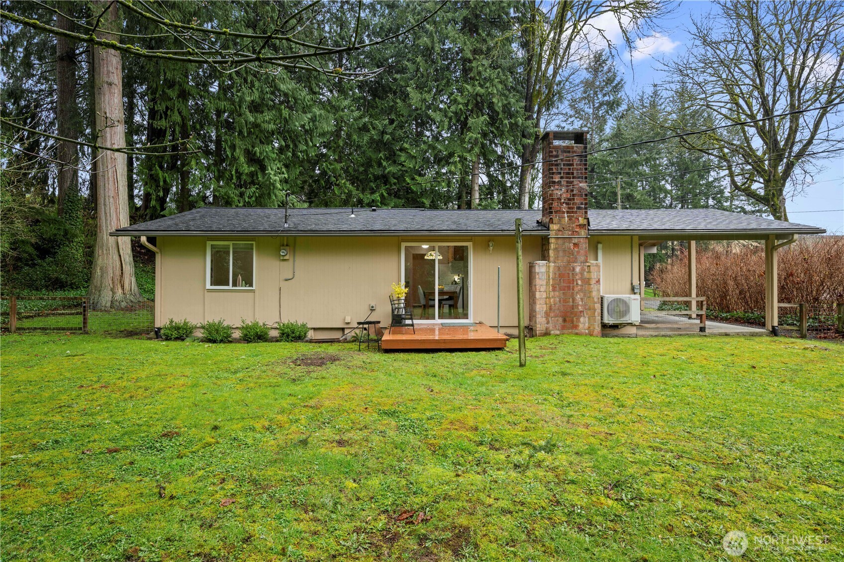 13523 80th Street Southeast Snohomish, WA 98290 - Photo 9 of 12 a front view of a house with a garden