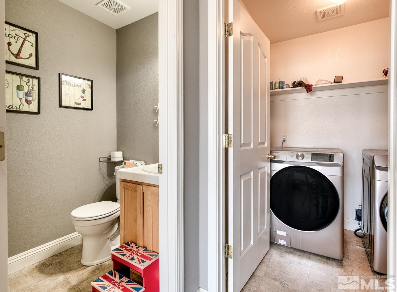 437 Rio Vista Drive Fallon, NV 89406 - Photo 19 of 24 a bathroom with a toilet and a sink