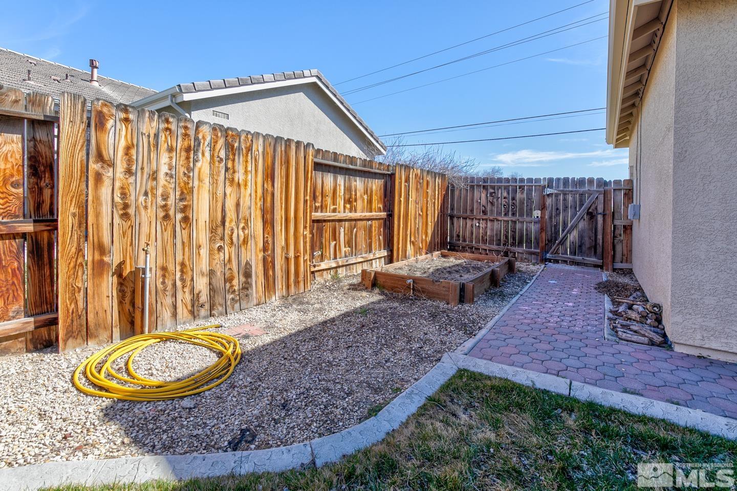 437 Rio Vista Drive Fallon, NV 89406 - Photo 22 of 24 a view of a backyard with furniture