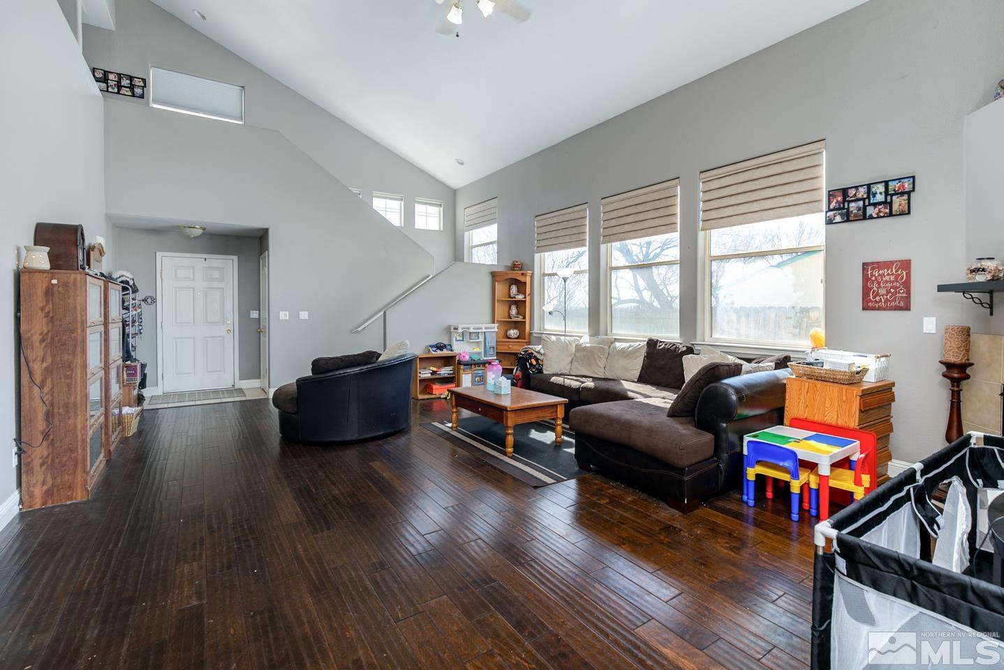 437 Rio Vista Drive Fallon, NV 89406 - Photo 4 of 24 a living room with furniture and a flat screen tv