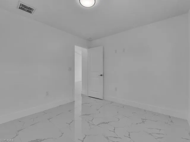 $539,999 | 55117-119 24th Street Southwest, Lehigh Acres, FL 33973