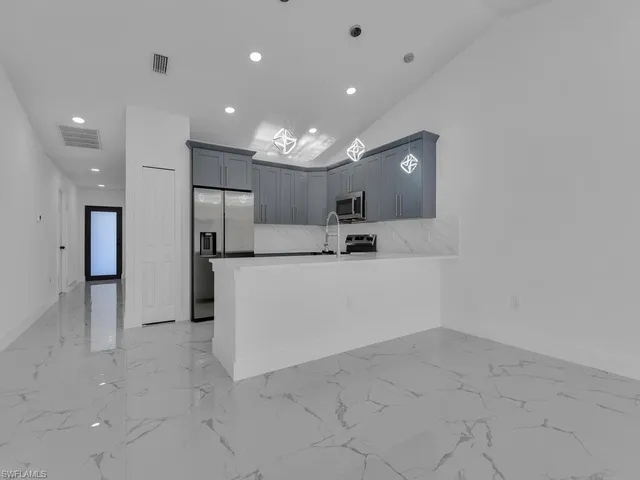 $539,999 | 55117-119 24th Street Southwest, Lehigh Acres, FL 33973