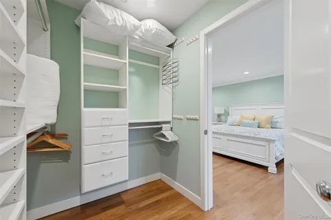 a bathroom with a sink a toilet and window