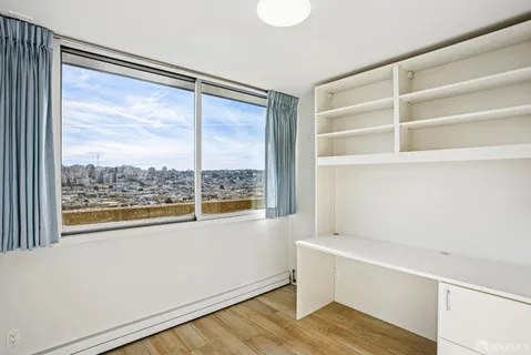 a view of balcony with furniture