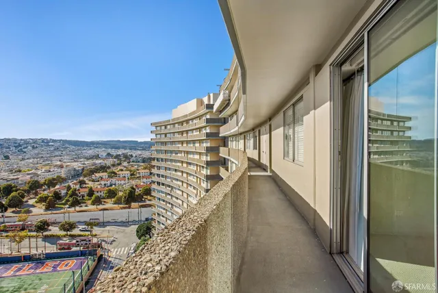 a view of a city from a balcony
