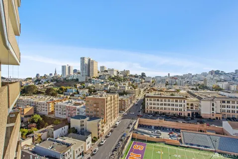 a view of a city with tall buildings