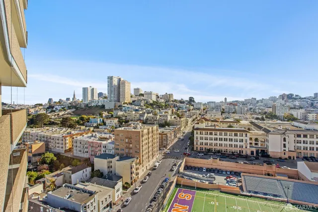 a view of a city with tall buildings