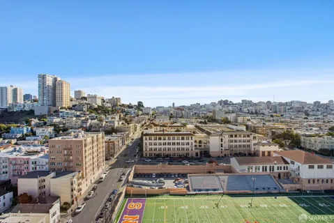 a view of city with tall buildings