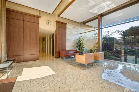 a view of a garden with a fountain