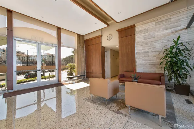 a view of a backyard with wooden fence