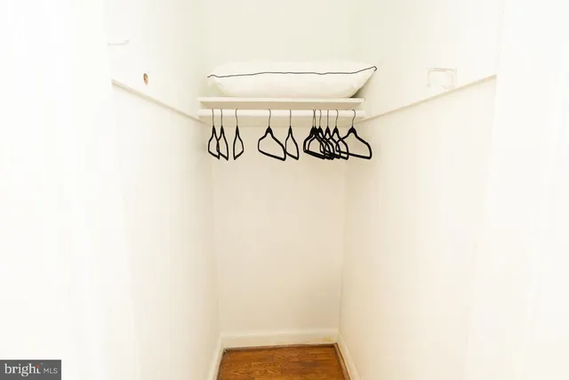 a bathroom with a sink a mirror and a shower