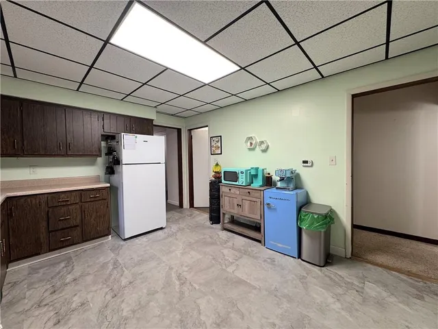 a kitchen that has a sink and a stove