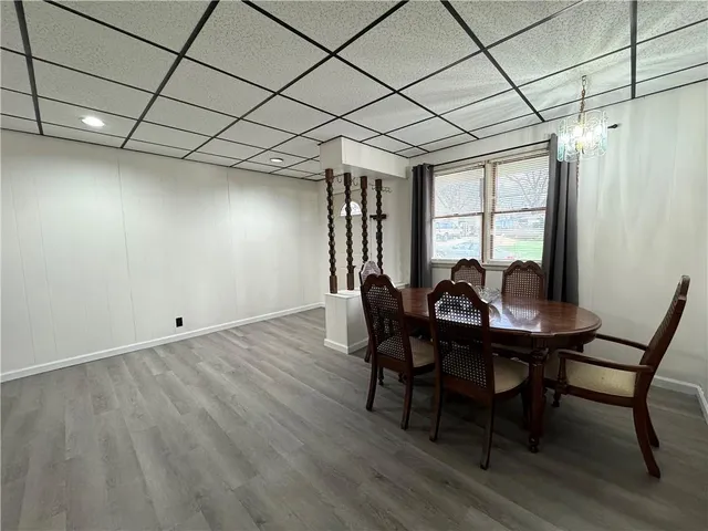 a bedroom with a bed and a table