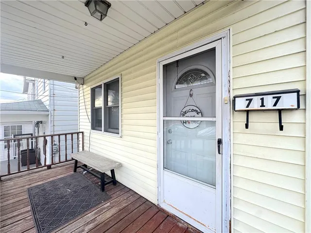 a view of front door and porch