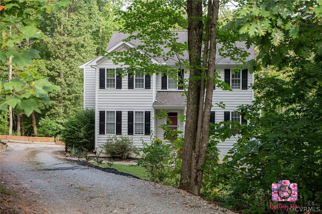 2936 Lowry Road Columbia, VA 23038 - Photo 1 of 11 a house with a tree in front of it