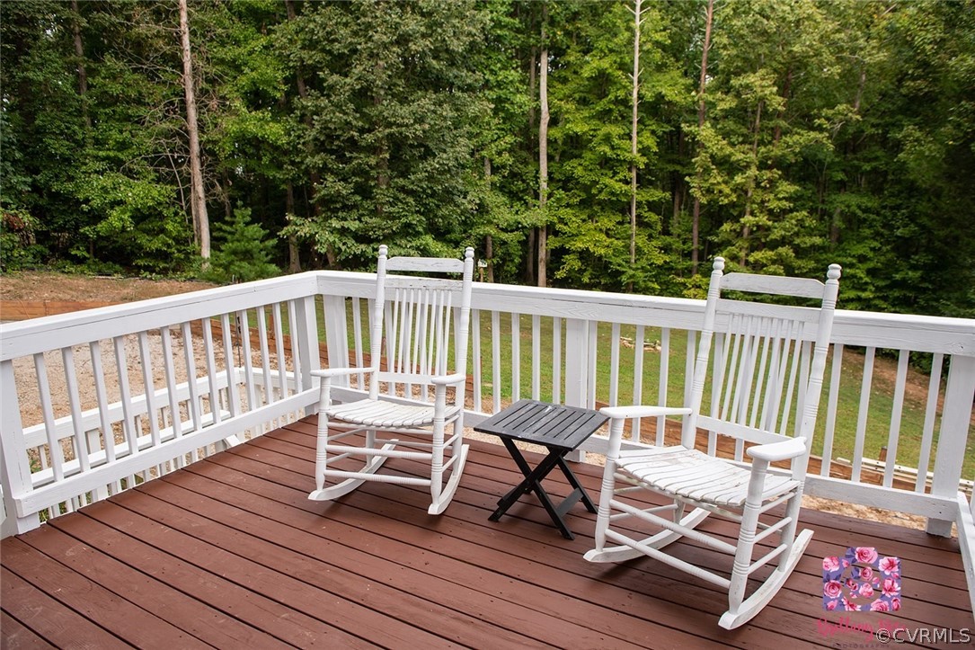 2936 Lowry Road Columbia, VA 23038 - Photo 11 of 11 a view of a chair and table on the wooden floor