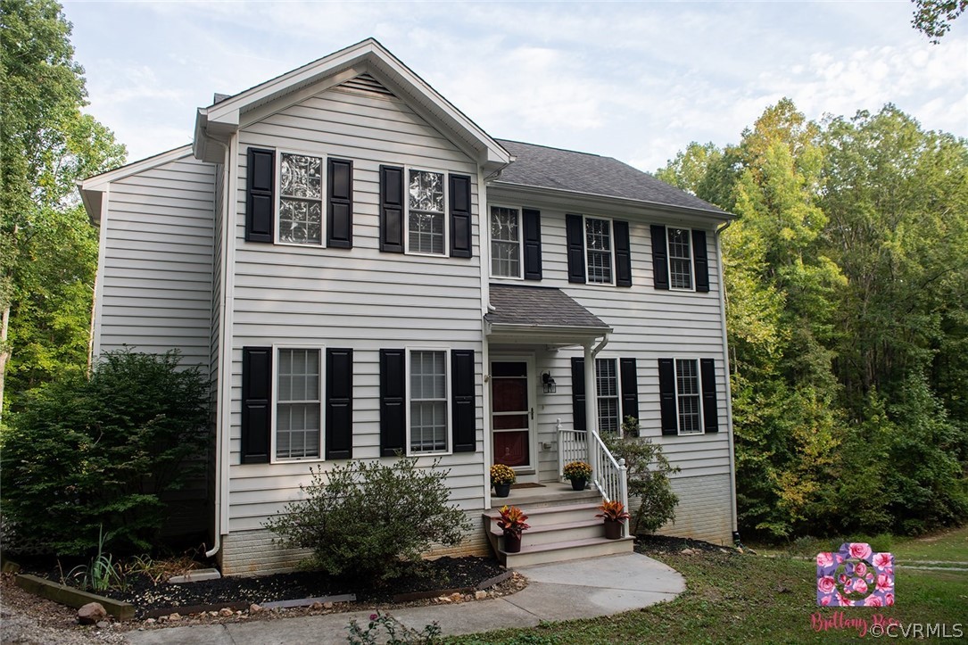 2936 Lowry Road Columbia, VA 23038 - Photo 2 of 11 a front view of house with yard and green space