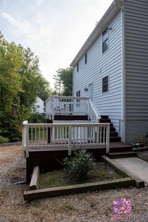 2936 Lowry Road Columbia, VA 23038 - Photo 3 of 11 a view of a house with wooden deck