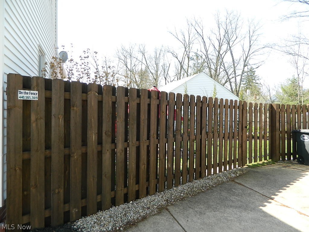 1604 Lyndhurst Road Lyndhurst, OH 44124 - Photo 29 of 35 Newer Privacy Fence on the Driveway Side - The Back Yard is Fully Fenced!
