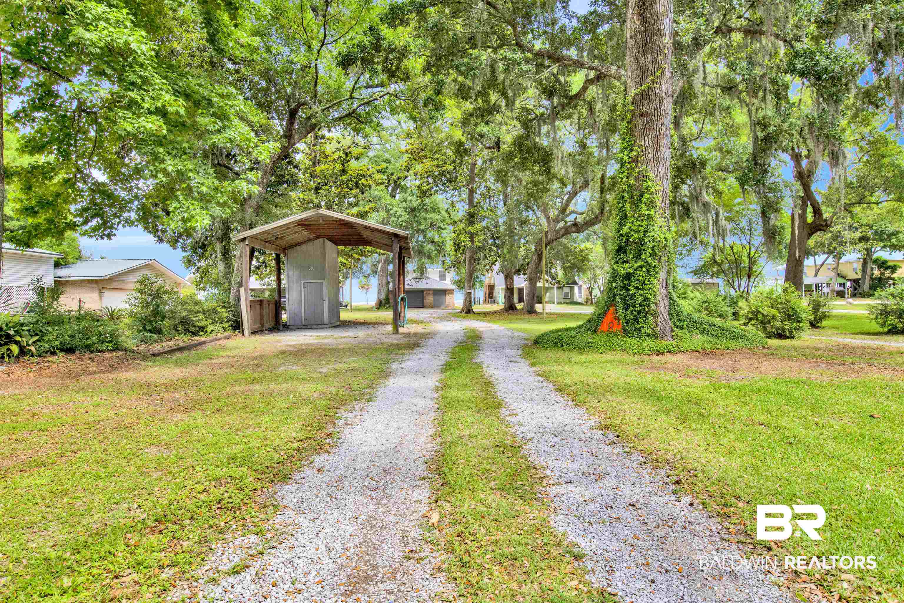 7411 Bay Road Mobile, AL 36605 - Photo 8 of 34 View of dirt / gravel driveway