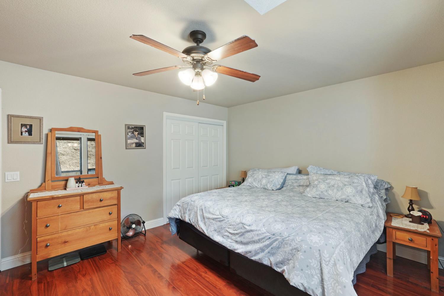 3234 Cambridge Road Cameron Park, CA 95682 - Photo 13 of 42 a bedroom with a bed and a dresser