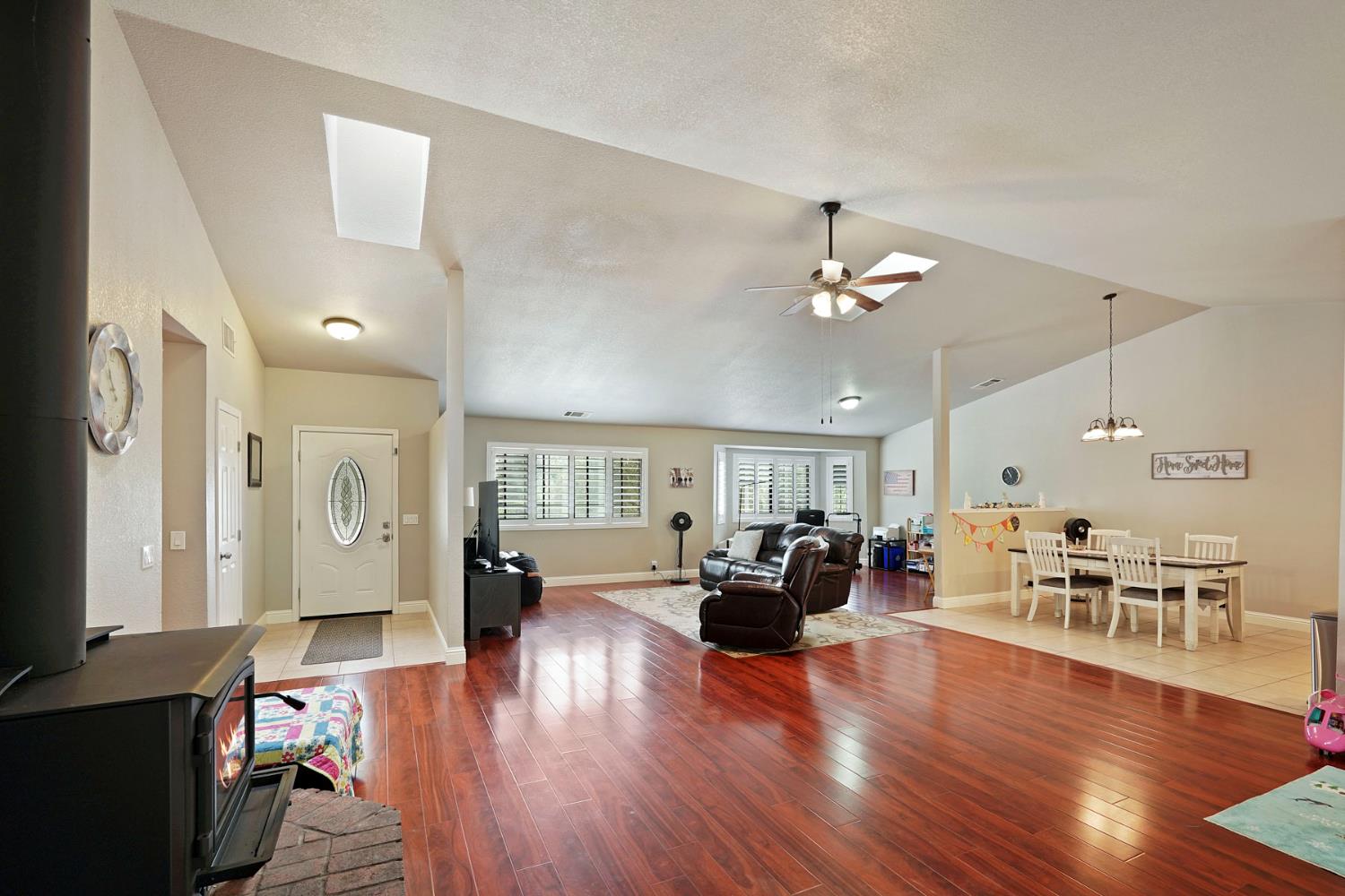 3234 Cambridge Road Cameron Park, CA 95682 - Photo 25 of 42 a living room with furniture and wooden floor