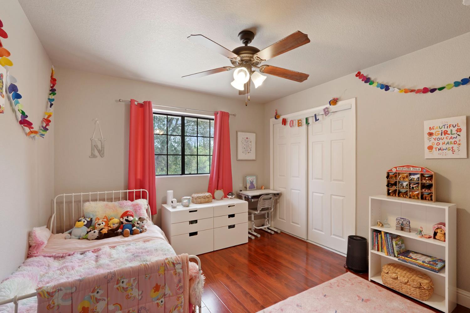 3234 Cambridge Road Cameron Park, CA 95682 - Photo 6 of 42 a bedroom with furniture and a window