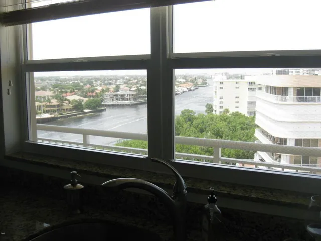 a view of a large window with a view of living room