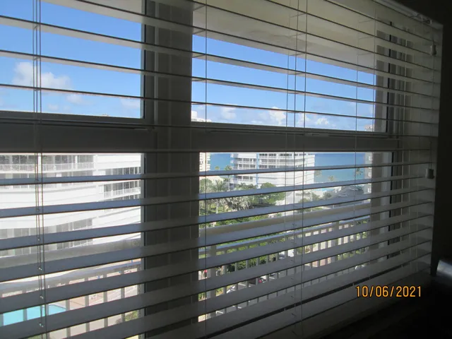 a kitchen with stainless steel appliances granite countertop a stove a sink dishwasher a refrigerator and a microwave