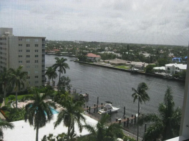 an aerial view of a city with lake view