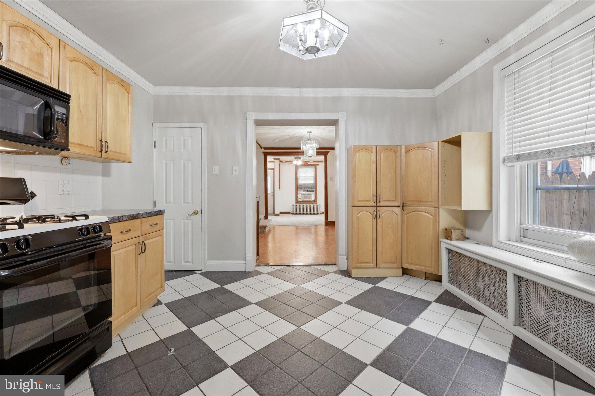 104 Maple Street Conshohocken, PA 19428 - Photo 5 of 15 Charming kitchen with classic tiles.