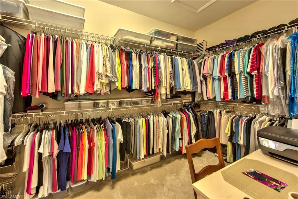 6922 Avalon Circle, Unit 206 Naples, FL 34112 - Photo 17 of 32 a view of a walk in closet