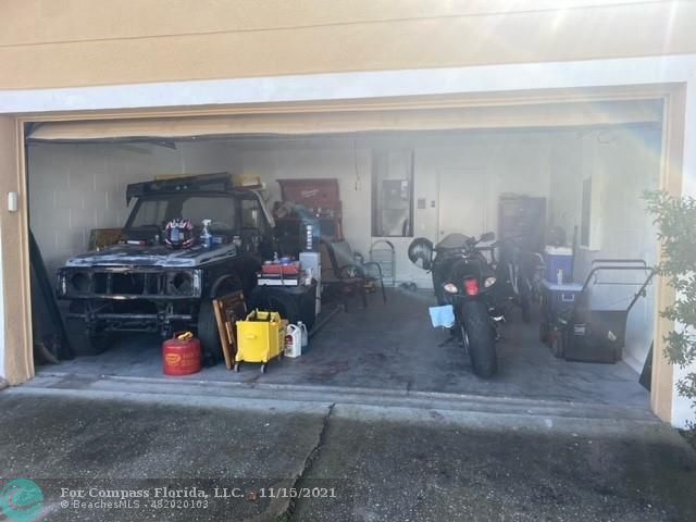 2147 Marisol Loop Kissimmee, FL 34743 - Photo 20 of 20 a view of a living room with furniture and a potted plant