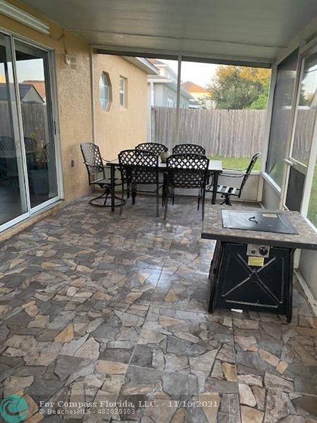 2147 Marisol Loop Kissimmee, FL 34743 - Photo 5 of 20 a dining room with furniture