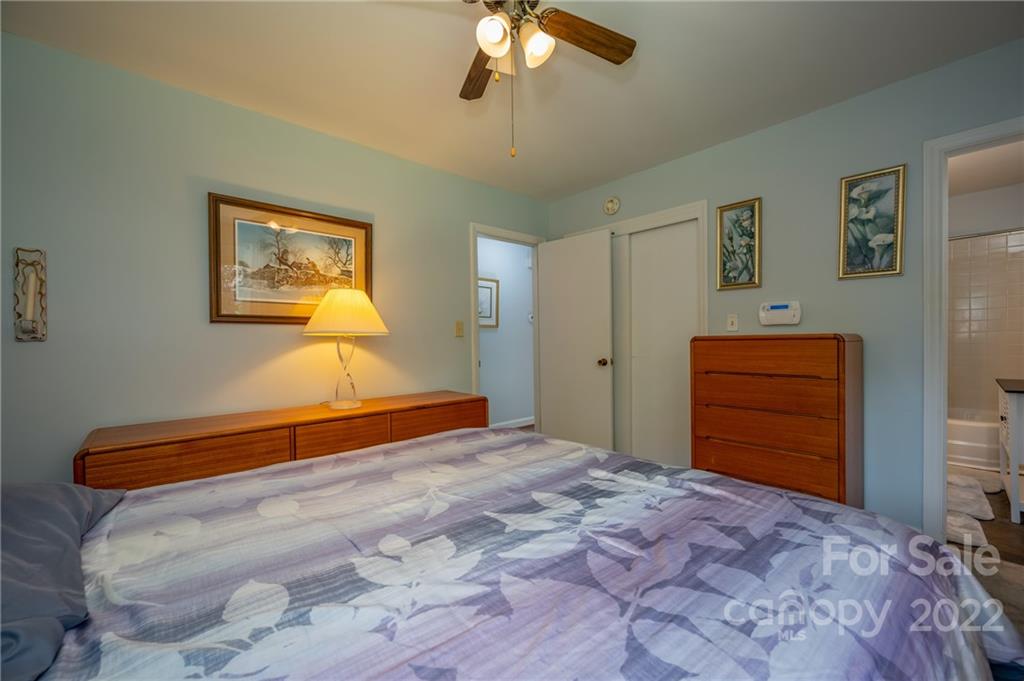 176 Crestview Street Rutherfordton, NC 28139 - Photo 23 of 38 a bedroom with a bed and a dresser