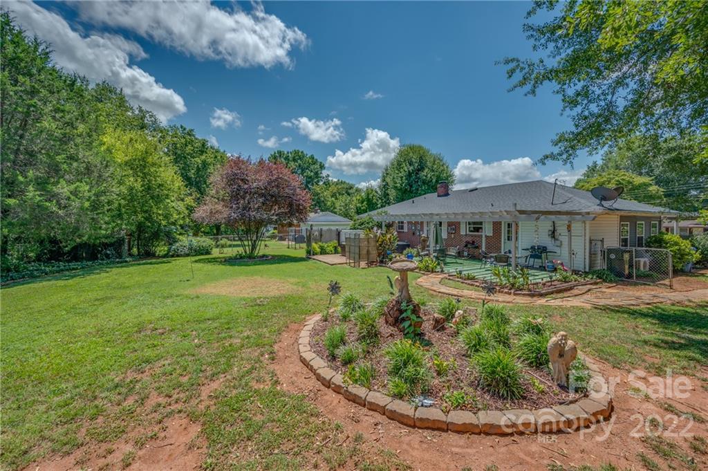 176 Crestview Street Rutherfordton, NC 28139 - Photo 31 of 38 a front view of house with yard and outdoor seating